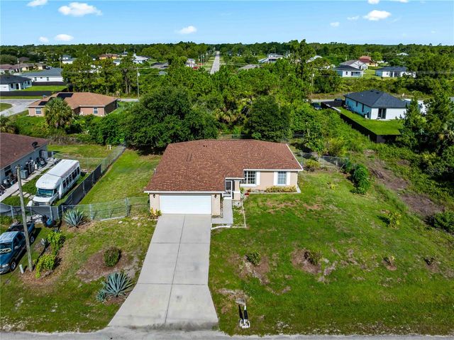 1103 LEE AVENUE, Lehigh Acres, FL 33972