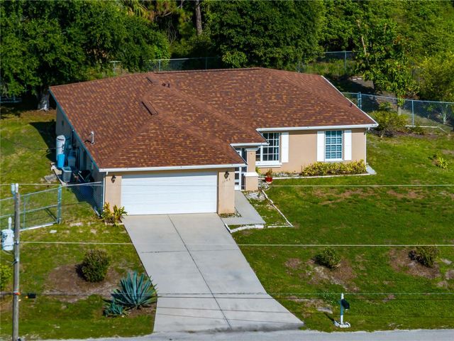 1103 LEE AVENUE, Lehigh Acres, FL 33972
