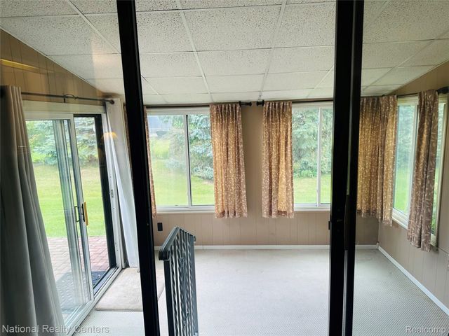 12421 Cambridge Boulevard 4, Green Oak Township, MI 48178