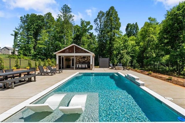 4660 Thatcher Woods Drive, Oak Ridge, NC 27310