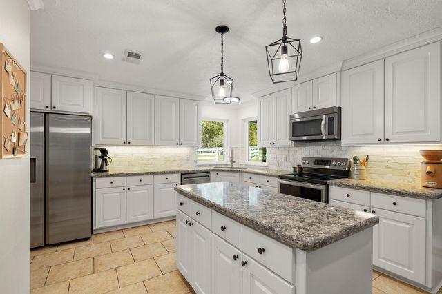 15966 Green Meadow Loop, Willis, TX 77318