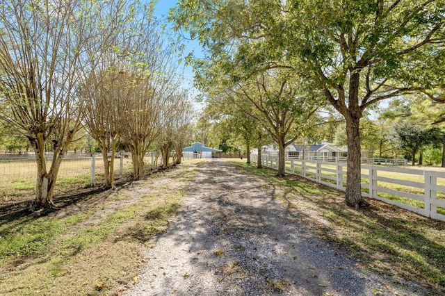 15966 Green Meadow Loop, Willis, TX 77318