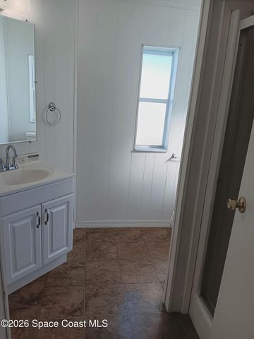 720 Lark Drive, Barefoot Bay, FL 32976