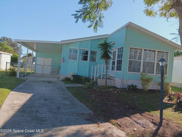 720 Lark Drive, Barefoot Bay, FL 32976