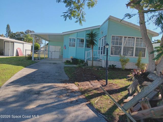 720 Lark Drive, Barefoot Bay, FL 32976