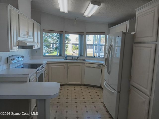 720 Lark Drive, Barefoot Bay, FL 32976