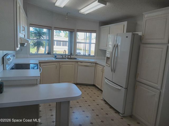 720 Lark Drive, Barefoot Bay, FL 32976