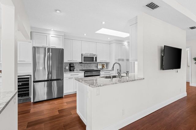 6689 Eastpointe Pines Street, Palm Beach Gardens, FL 33418