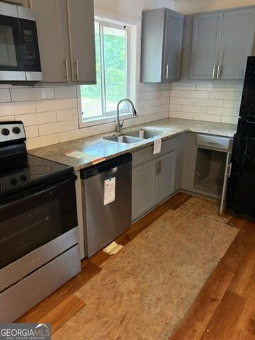 562 Roxbury Drive, Riverdale, GA 30274