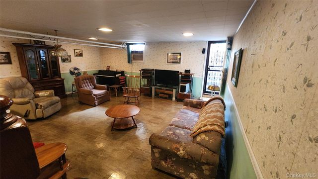 79-04 Kneeland Avenue, Elmhurst, NY 11373