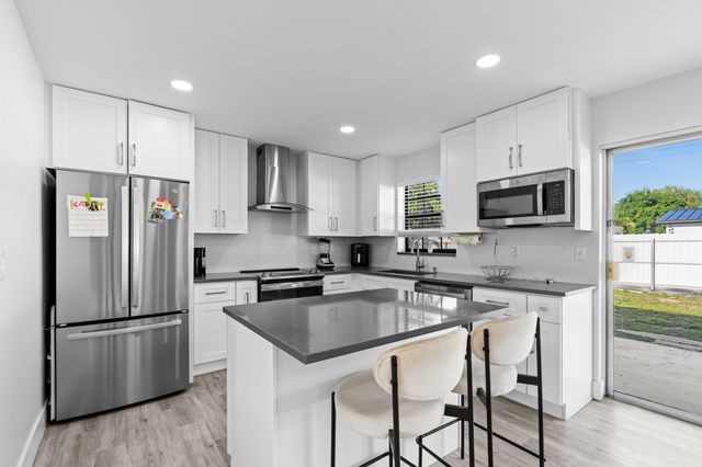 1713 Roy Drive, West Palm Beach, FL 33415