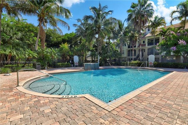 5840 W Sample Rd 201, Coral Springs, FL 33067