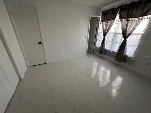 6077 VILLAGE CIRCLE 6077, Orlando, FL 32822