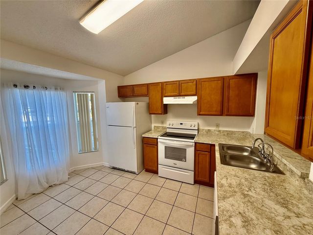 1128 JADE EAST LANE, Kissimmee, FL 34744