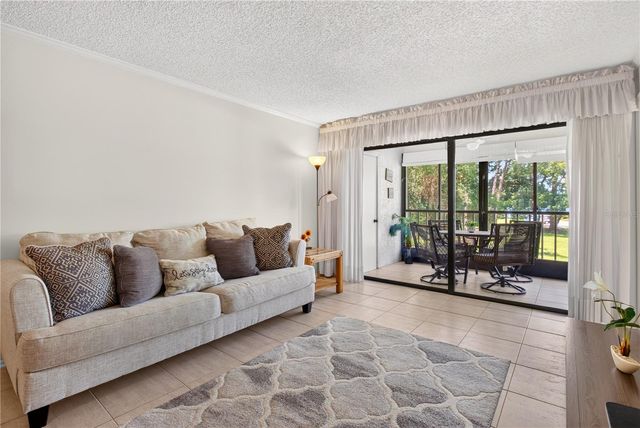 3276 CANDLE RIDGE COURT 202, Orlando, FL 32822