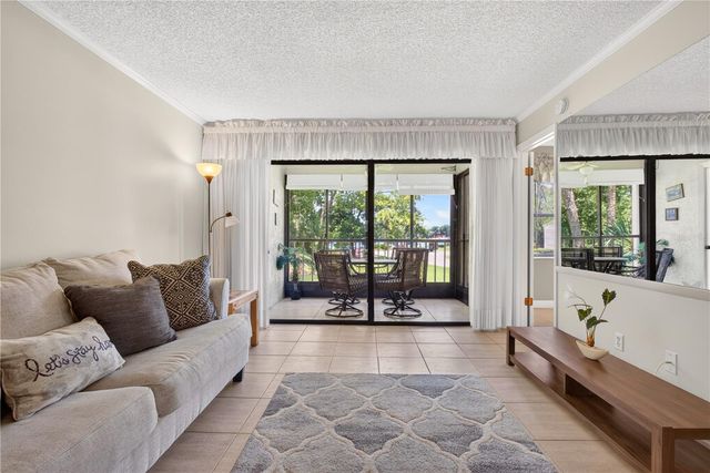 3276 CANDLE RIDGE COURT 202, Orlando, FL 32822