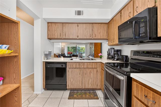 3276 CANDLE RIDGE COURT 202, Orlando, FL 32822