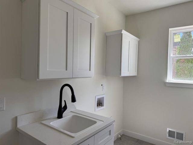 9355 Highland Drive, Grosse Ile, MI 48138
