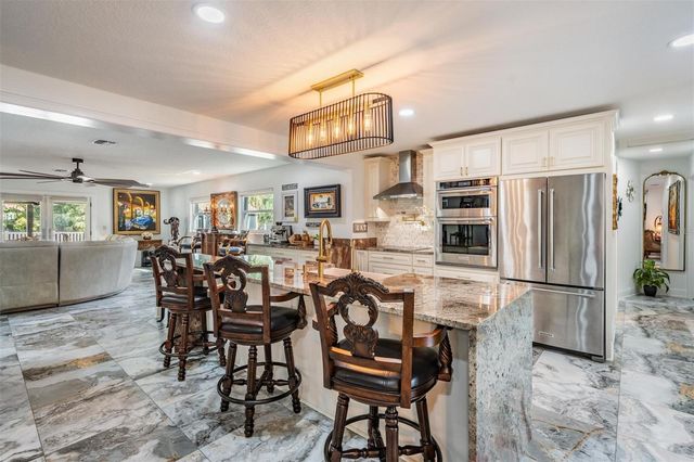 6907 W CREEK DRIVE, Tampa, FL 33615