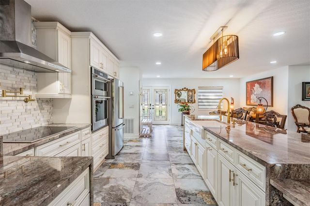 6907 W CREEK DRIVE, Tampa, FL 33615