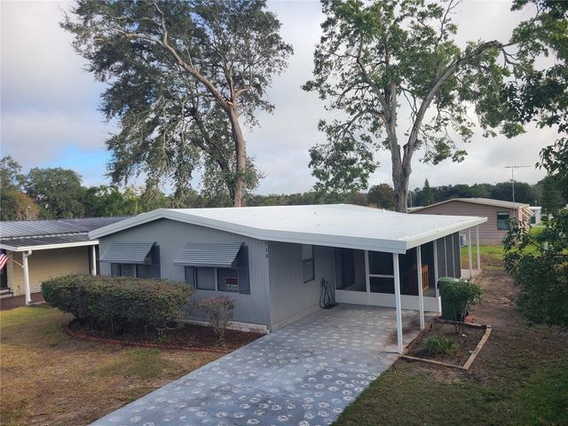 710 COACHMAN DRIVE, Leesburg, FL 34748