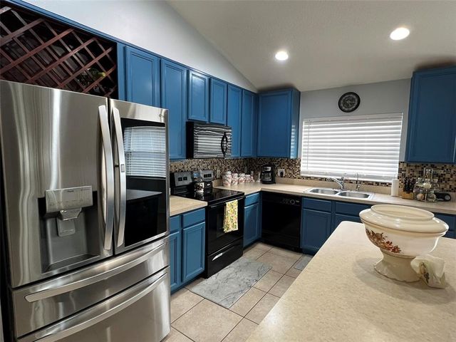 923 TRAMELLS TRAIL, Kissimmee, FL 34744