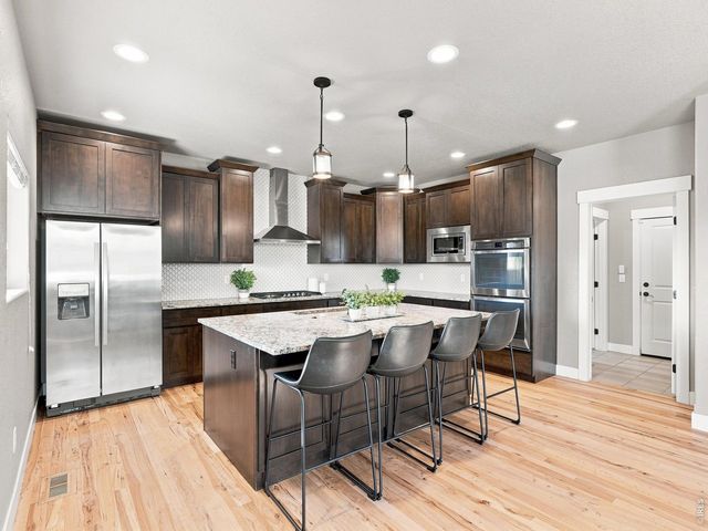608 Vermilion Peak Dr, Windsor, CO 80550