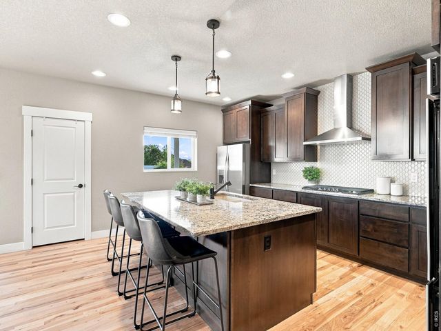 608 Vermilion Peak Dr, Windsor, CO 80550