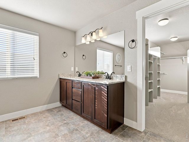 608 Vermilion Peak Dr, Windsor, CO 80550