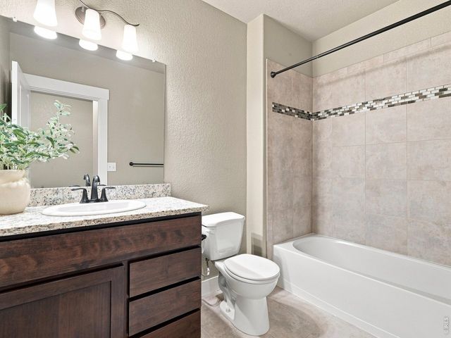 608 Vermilion Peak Dr, Windsor, CO 80550