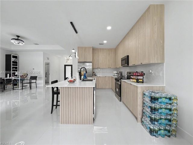 402 Thompson Avenue, Lehigh Acres, FL 33972