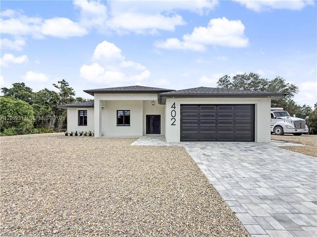 402 Thompson Avenue, Lehigh Acres, FL 33972