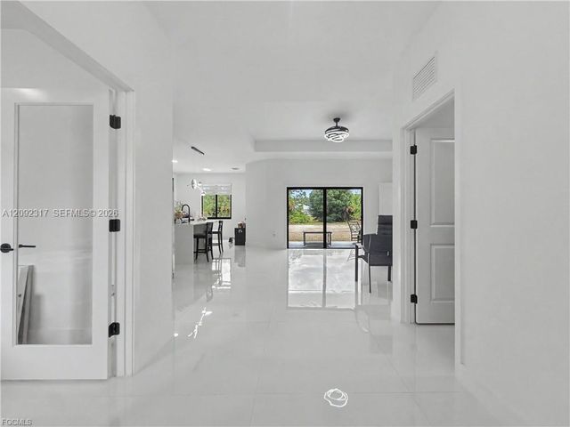 402 Thompson Avenue, Lehigh Acres, FL 33972
