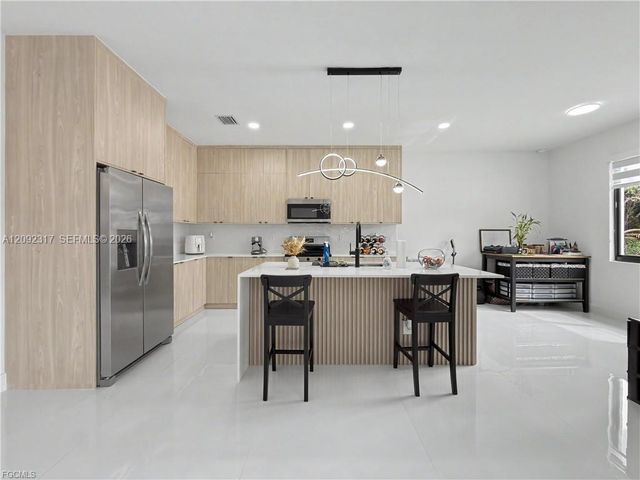 402 Thompson Avenue, Lehigh Acres, FL 33972
