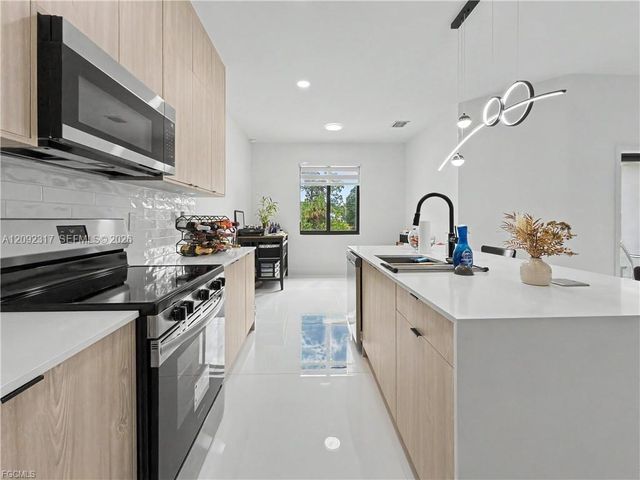 402 Thompson Avenue, Lehigh Acres, FL 33972