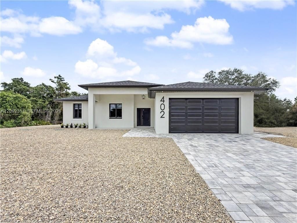 402 Thompson Avenue, Lehigh Acres, FL 33972