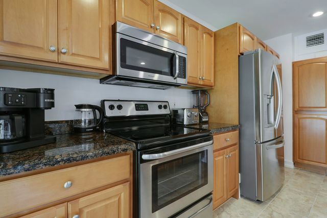 606 BRACKENWOOD Cove, Palm Beach Gardens, FL 33418