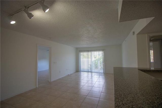 5045 WILES Road 205, Coconut Creek, FL 33073