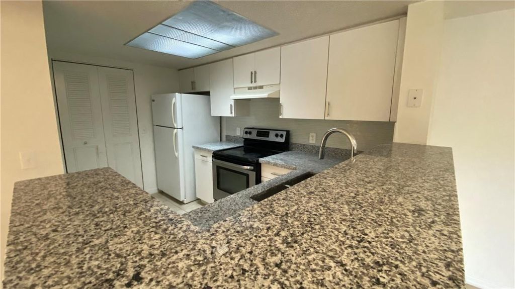 5045 WILES Road 205, Coconut Creek, FL 33073