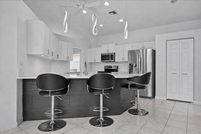 2869 Waters Edge Circle, Greenacres, FL 33413