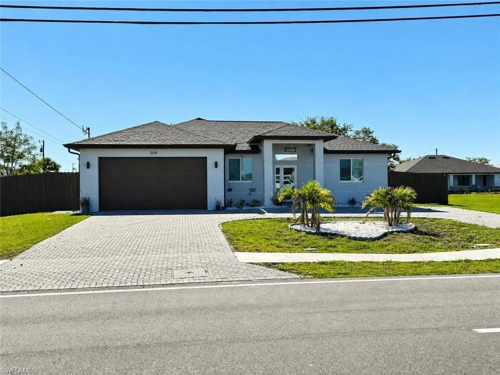 209 Nelson RD N, CAPE CORAL, FL 33993 — exterior