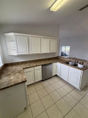 205 GOLF AIRE BOULEVARD, Haines City, FL 33844