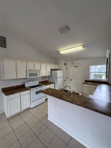 205 GOLF AIRE BOULEVARD, Haines City, FL 33844