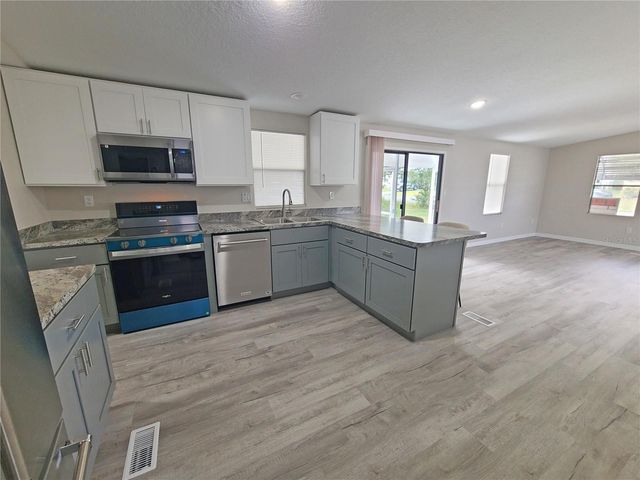 710 COACHMAN DRIVE, Leesburg, FL 34748