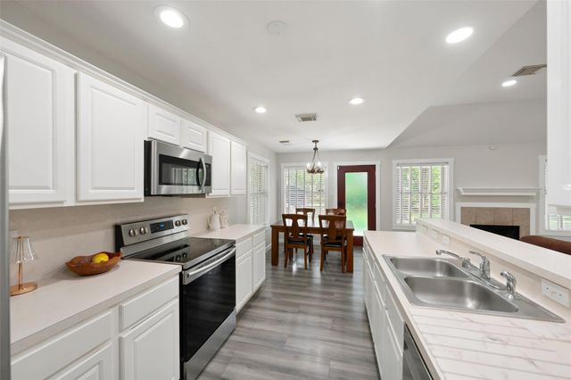 7318 Ramblewood Drive, Magnolia, TX 77354