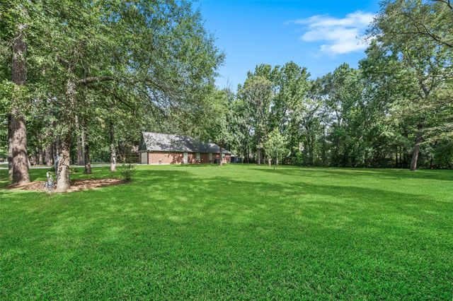 7318 Ramblewood Drive, Magnolia, TX 77354