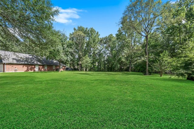 7318 Ramblewood Drive, Magnolia, TX 77354