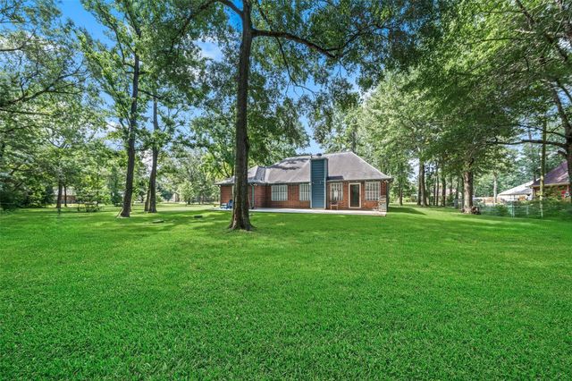 7318 Ramblewood Drive, Magnolia, TX 77354