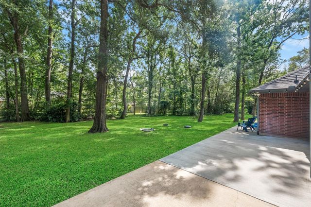 7318 Ramblewood Drive, Magnolia, TX 77354