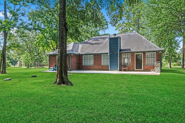 7318 Ramblewood Drive, Magnolia, TX 77354